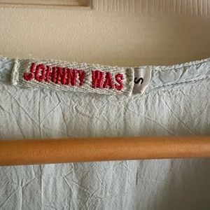 Small Johnny was turquoise blouse